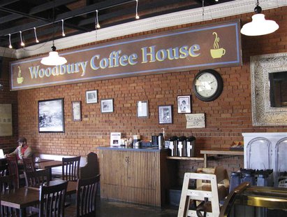 The Senoia Coffee and Cafe Shop displays the Woodbury Coffee House sign that was hung outside during the filming of the TV show The Walking The Senoia Coffee and Cafe Shop displays the Woodbury Coffee House sign that was hung outside during the filming of the TV show The Walking
