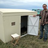 Ruben Mares demonstrates a viewing blind - Photo courtesy Ft. Pierre Ranger District