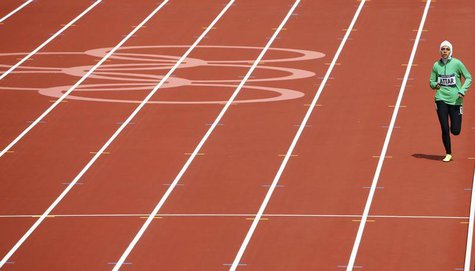 Saudi Arabia's Sarah Attar runs in her women's 800m round 1 heat during the London 2012 Olympic Games at the Olympic Stadium August 8, 2012. Saudi Arabia's Sarah Attar runs in her women's 800m round 1 heat during the London 2012 Olympic Games at the Olympic Stadium August 8, 2012.