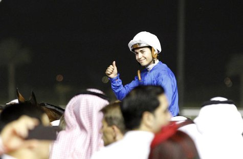 Mickael Barzalona, riding Monterosso, celebrates after winning the ninth and final race of the 17th Dubai World Cup at the Meydan racecourse Mickael Barzalona, riding Monterosso, celebrates after winning the ninth and final race of the 17th Dubai World Cup at the Meydan racecourse