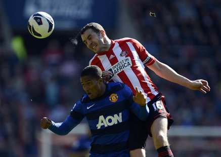 Sunderland's John O'Shea (R) challenges Manchester United's Antonio Valencia during their English Premier League soccer match in Sunderland, Sunderland's John O'Shea (R) challenges Manchester United's Antonio Valencia during their English Premier League soccer match in Sunderland,