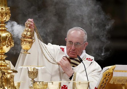 Pope Francis holds the incense burner as he leads a vigil mass during Easter celebrations at St. Peter's Basilica in the Vatican March 30, 2 Pope Francis holds the incense burner as he leads a vigil mass during Easter celebrations at St. Peter's Basilica in the Vatican March 30, 2