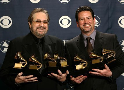 Producers Phil Ramone and John Burk hold the awards won by Ray Charles and his album "Genius Loves Company" at the 47th annual Grammy Awards Producers Phil Ramone and John Burk hold the awards won by Ray Charles and his album "Genius Loves Company" at the 47th annual Grammy Awards