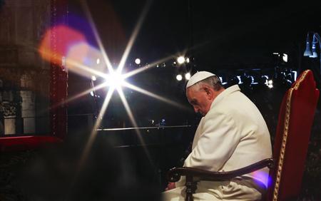 Pope Francis leads the Via Crucis (Way of the Cross) procession during Good Friday at the Colosseum in Rome March 29, 2013. Holy Week is celebrated in many Christian traditions during the week before Easter.
Credit: Reuters/Alessandro Bianchi Pope Francis leads the Via Crucis (Way of the Cross) procession during Good Friday at the Colosseum in Rome March 29, 2013. Holy Week is celebrated in many Christian traditions during the week before Easter.
Credit: Reuters/Alessandro Bianchi