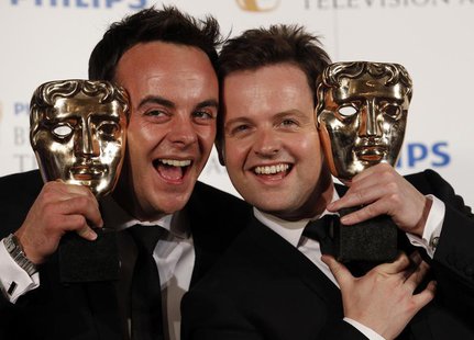 Presenters Ant McPartlin (L) and Dec Donnelly pose with the British Academy Television Awards Entertainment Performance Award at the Palladi Presenters Ant McPartlin (L) and Dec Donnelly pose with the British Academy Television Awards Entertainment Performance Award at the Palladi