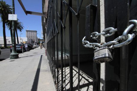 Shuttered and padlocked businesses line Main Street in Stockton, California June 27, 2012. REUTERS/Kevin Bartram Shuttered and padlocked businesses line Main Street in Stockton, California June 27, 2012. REUTERS/Kevin Bartram
