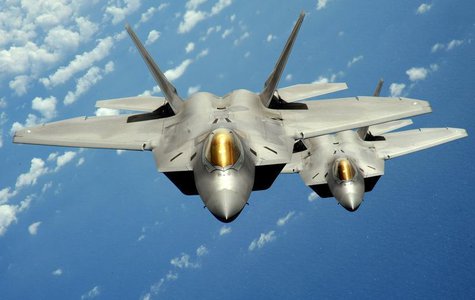 Two U.S. Air Force F-22 Raptor stealth jet fighters fly near Andersen Air Force Base in this handout photo dated August 4, 2010. REUTERS/U.S Two U.S. Air Force F-22 Raptor stealth jet fighters fly near Andersen Air Force Base in this handout photo dated August 4, 2010. REUTERS/U.S