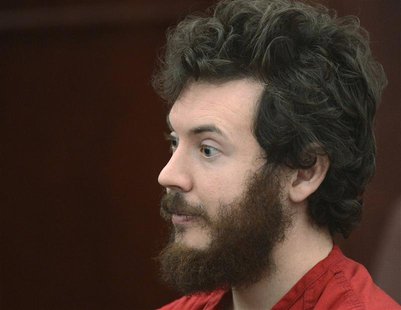 Accused Aurora theater gunman James Holmes listens during his arraignment in Centennial, Colorado March 12, 2013. REUTERS/R.J. Sangosti/Pool Accused Aurora theater gunman James Holmes listens during his arraignment in Centennial, Colorado March 12, 2013. REUTERS/R.J. Sangosti/Pool