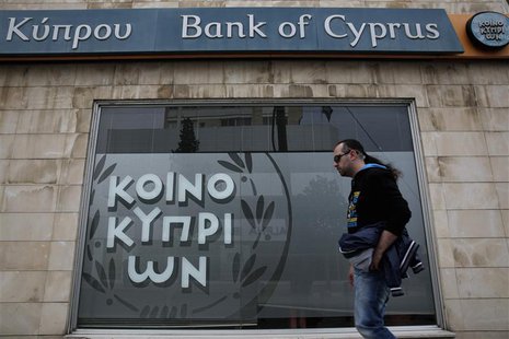 A man walks past a branch of Bank of Cyprus in Nicosia March 31, 2013. REUTERS/Yorgos Karahalis A man walks past a branch of Bank of Cyprus in Nicosia March 31, 2013. REUTERS/Yorgos Karahalis