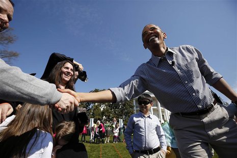 U.S. President Barack Obama greets the parents of children participating in the 135th annual Easter Egg Roll on the South Lawn of the White U.S. President Barack Obama greets the parents of children participating in the 135th annual Easter Egg Roll on the South Lawn of the White