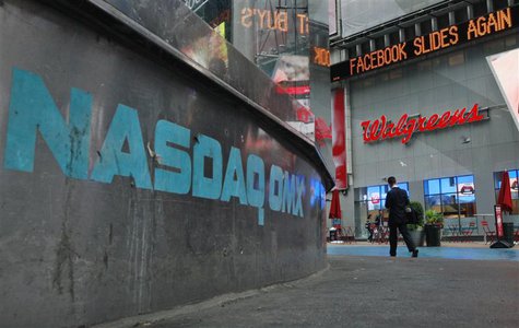 The Nasdaq logo is seen on the exterior of the Nasdaq MarketSite as a headline about the Facebook stock scrolls on the Times Square Newstick The Nasdaq logo is seen on the exterior of the Nasdaq MarketSite as a headline about the Facebook stock scrolls on the Times Square Newstick