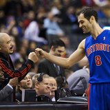 Detroit Pistons' Jose Calderon greets announcer Herbie Kuhn (L) before his team plays the Toronto Raptors in their NBA basketball game in To Detroit Pistons' Jose Calderon greets announcer Herbie Kuhn (L) before his team plays the Toronto Raptors in their NBA basketball game in To