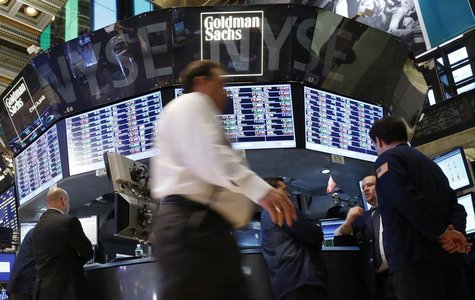 Traders work at the Goldman Sachs kiosk on the floor of the New York Stock Exchange, January 30, 2013. REUTERS/Brendan McDermid Traders work at the Goldman Sachs kiosk on the floor of the New York Stock Exchange, January 30, 2013. REUTERS/Brendan McDermid
