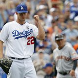 Los Angeles Dodgers starting pitcher Clayton Kershaw pumps his fist as the Dodgers defeat the San Francisco Giants 4-0 during their MLB Nati Los Angeles Dodgers starting pitcher Clayton Kershaw pumps his fist as the Dodgers defeat the San Francisco Giants 4-0 during their MLB Nati
