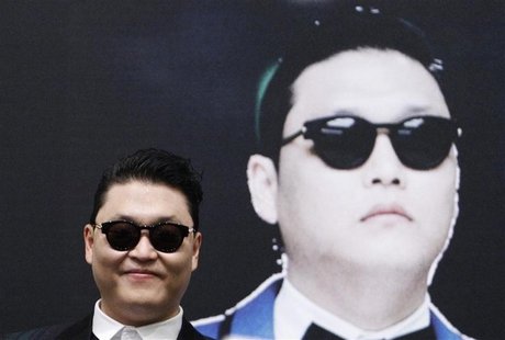 South Korean rapper Psy attends a news conference before a free concert at the Marina Bay Sands in Singapore, in this December 1, 2012 file South Korean rapper Psy attends a news conference before a free concert at the Marina Bay Sands in Singapore, in this December 1, 2012 file