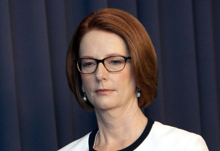 Australian Prime Minister Julia Gillard leaves a media conference at Parliament House in Canberra March 21, 2013. REUTERS/Andrew Taylor Australian Prime Minister Julia Gillard leaves a media conference at Parliament House in Canberra March 21, 2013. REUTERS/Andrew Taylor