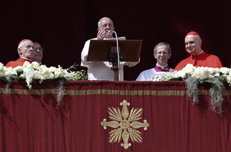 Pope Francis speaks during his "Urbi et Orbi" (To the City and the World) address from a balcony in St. Peter's Square at the Vatican March Pope Francis speaks during his "Urbi et Orbi" (To the City and the World) address from a balcony in St. Peter's Square at the Vatican March