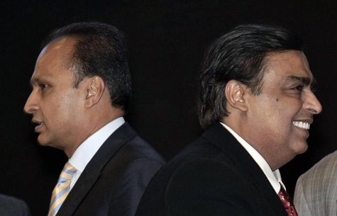 Mukesh Ambani (R), chairman of Reliance Industries, and his brother Anil Ambani, chairman of Reliance Group, attend the inauguration ceremon Mukesh Ambani (R), chairman of Reliance Industries, and his brother Anil Ambani, chairman of Reliance Group, attend the inauguration ceremon