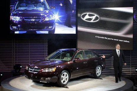President and CEO of Hyundai America talks about the 2006 Hyundai Sonata at the 2005 North American International Auto Show. REUTERS/Gregory President and CEO of Hyundai America talks about the 2006 Hyundai Sonata at the 2005 North American International Auto Show. REUTERS/Gregory