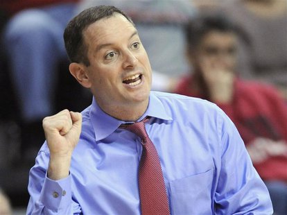 Rutgers Scarlet Knights coach Mike Rice reacts during the first half of their NCAA men's basketball game against the Syracuse Orange in Pisc Rutgers Scarlet Knights coach Mike Rice reacts during the first half of their NCAA men's basketball game against the Syracuse Orange in Pisc