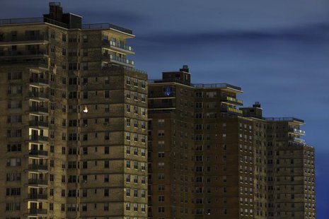 A single room is illuminated in a block of high-rise apartment buildings in the Brighton Beach neighborhood of New York, November 2, 2012. R A single room is illuminated in a block of high-rise apartment buildings in the Brighton Beach neighborhood of New York, November 2, 2012. R