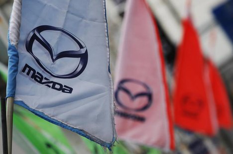 Logos of Mazda Motor Corp are seen at a dealership in Tokyo March 1, 2012. REUTERS/Toru Hanai Logos of Mazda Motor Corp are seen at a dealership in Tokyo March 1, 2012. REUTERS/Toru Hanai
