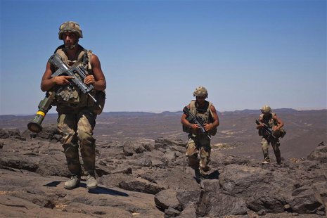 French soldiers patrol in the Terz valley, about 60 km (37 miles) south of the town of Tessalit in northern Mali March 20, 2013. REUTERS/Fra French soldiers patrol in the Terz valley, about 60 km (37 miles) south of the town of Tessalit in northern Mali March 20, 2013. REUTERS/Fra