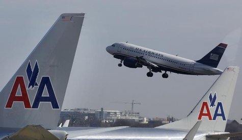 A U.S. Airways jet departs Washington's Reagan National Airport next to American Airlines jets outside Washington, February 25, 2013. REUTER A U.S. Airways jet departs Washington's Reagan National Airport next to American Airlines jets outside Washington, February 25, 2013. REUTER