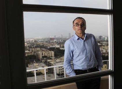 Director Danny Boyle poses for a portrait while promoting his movie "Trance" in Los Angeles, California March 16, 2013. Picture taken March Director Danny Boyle poses for a portrait while promoting his movie "Trance" in Los Angeles, California March 16, 2013. Picture taken March