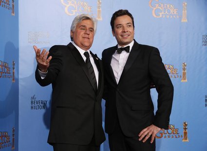 Late night talk show hosts Jay Leno (L) and Jimmy Fallon pose backstage at the 70th annual Golden Globe Awards in Beverly Hills, California, Late night talk show hosts Jay Leno (L) and Jimmy Fallon pose backstage at the 70th annual Golden Globe Awards in Beverly Hills, California,