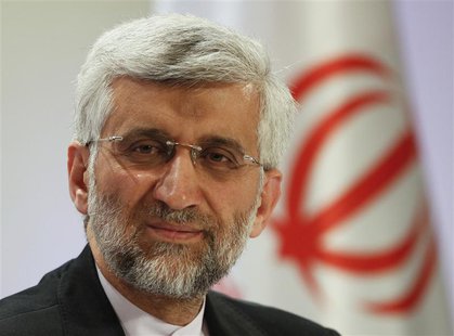 Iran's Supreme National Security Council Secretary and chief nuclear negotiator Saeed Jalili listens during a news conference in Almaty Febr Iran's Supreme National Security Council Secretary and chief nuclear negotiator Saeed Jalili listens during a news conference in Almaty Febr