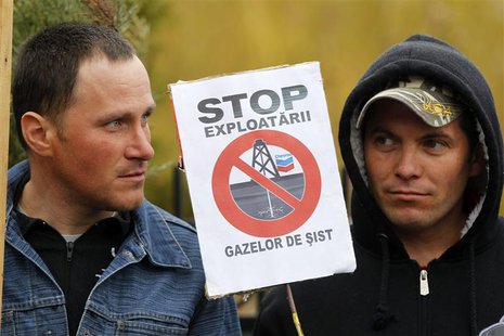 People attend a protest against Chevron's plans to explore for shale gas in Barlad, 266 km northeast of Bucharest, April 4, 2013. REUTERS/Bo People attend a protest against Chevron's plans to explore for shale gas in Barlad, 266 km northeast of Bucharest, April 4, 2013. REUTERS/Bo