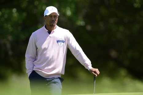 Tiger Woods of the U.S. waits to putt on the 13th hole during the 2013 Tavistock Cup golf tournament at Isleworth Golf and Country Club in W Tiger Woods of the U.S. waits to putt on the 13th hole during the 2013 Tavistock Cup golf tournament at Isleworth Golf and Country Club in W