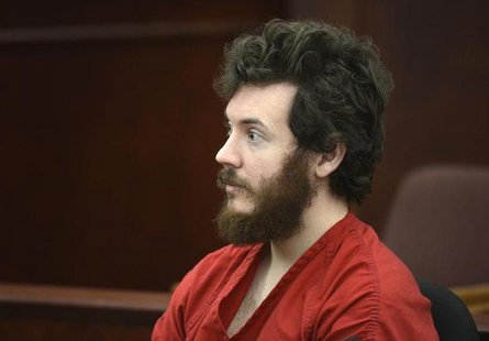 Accused Aurora theater shooting suspect James Holmes listens at his arraignment in Centennial, Colorado March 12, 2013. REUTERS/R.J. Sangost Accused Aurora theater shooting suspect James Holmes listens at his arraignment in Centennial, Colorado March 12, 2013. REUTERS/R.J. Sangost
