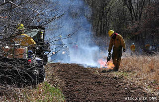 Wisconsin DNR workers carry out a prescribed burn (file photo) Wisconsin DNR workers carry out a prescribed burn (file photo)