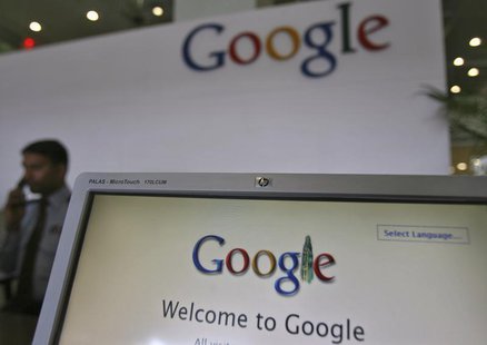 A security personnel answers a call at the reception counter of the Google office in the southern Indian city of Hyderabad February 6, 2012. A security personnel answers a call at the reception counter of the Google office in the southern Indian city of Hyderabad February 6, 2012.