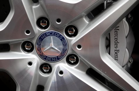 The company's logo is seen on the wheel of a Mercedes S-class limousine during a photo opportunity at the plant of German car manufacturer M The company's logo is seen on the wheel of a Mercedes S-class limousine during a photo opportunity at the plant of German car manufacturer M