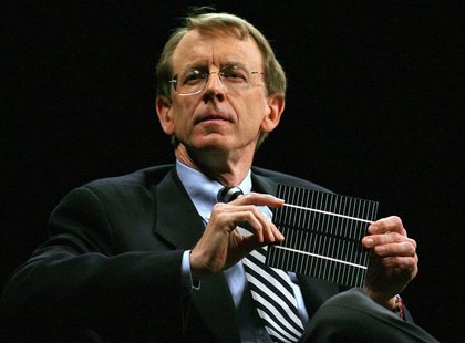 Venture capitalist John Doerr shows a flexible solar panel during a panel discussion at the 2006 TechNet Innovation Summit at the Stanford U Venture capitalist John Doerr shows a flexible solar panel during a panel discussion at the 2006 TechNet Innovation Summit at the Stanford U