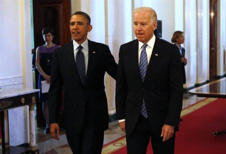 U.S. President Barack Obama and Vice President Joe Biden arrive for the Easter Prayer Breakfast held in the East Room of the White House in U.S. President Barack Obama and Vice President Joe Biden arrive for the Easter Prayer Breakfast held in the East Room of the White House in