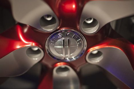 The Fisker automotive electric Atlantic sedan logo is seen on the car's tire during its unveiling ahead of the 2012 International Auto Show The Fisker automotive electric Atlantic sedan logo is seen on the car's tire during its unveiling ahead of the 2012 International Auto Show