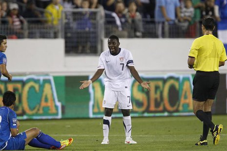 Freddy Adu of the U.S. (C) reacts to getting a yellow card during their CONCACAF Olympic qualifying soccer match against El Salvador in Nash Freddy Adu of the U.S. (C) reacts to getting a yellow card during their CONCACAF Olympic qualifying soccer match against El Salvador in Nash
