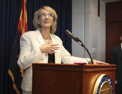 Arizona Governor Jan Brewer addresses the media in Phoenix, Arizona, June 25, 2012. REUTERS/Darryl Webb Arizona Governor Jan Brewer addresses the media in Phoenix, Arizona, June 25, 2012. REUTERS/Darryl Webb