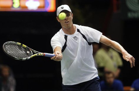 Sam Querrey of the U.S. hits a return to Viktor Troicki of Serbia during their Davis Cup quarter-finals tennis match in Boise, Idaho, April Sam Querrey of the U.S. hits a return to Viktor Troicki of Serbia during their Davis Cup quarter-finals tennis match in Boise, Idaho, April