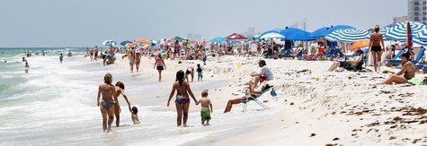 Tourists crowd the beach in Perdido Key, Florida May 19, 2012. REUTERS/Sean Gardner Tourists crowd the beach in Perdido Key, Florida May 19, 2012. REUTERS/Sean Gardner