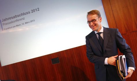 Jens Weidmann, President of Germany's federal reserve bank Bundesbank smiles as he takes his papers after the bank's annual news conference Jens Weidmann, President of Germany's federal reserve bank Bundesbank smiles as he takes his papers after the bank's annual news conference
