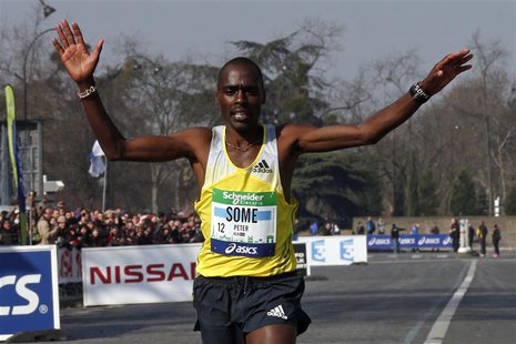 Kenya's Peter Some crosses the finish line to win the 37th Paris Marathon in Paris April 7, 2013. REUTERS/Benoit Tessier Kenya's Peter Some crosses the finish line to win the 37th Paris Marathon in Paris April 7, 2013. REUTERS/Benoit Tessier