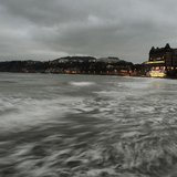 The tide comes in as the sun sets on the seafront in Scarborough, northern England February 26, 2013. REUTERS/Dylan Martinez