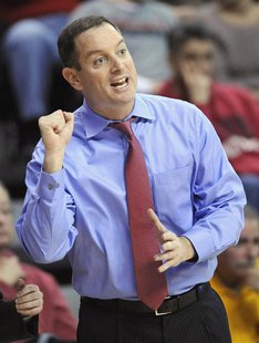Rutgers Scarlet Knights coach Mike Rice reacts during the first half of their NCAA men's basketball game against the Syracuse Orange in Pisc Rutgers Scarlet Knights coach Mike Rice reacts during the first half of their NCAA men's basketball game against the Syracuse Orange in Pisc