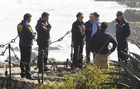 Police officers and forensic experts inspect the tomb of Chilean poet and Nobel laureate Pablo Neruda inside the grounds his house-museum be Police officers and forensic experts inspect the tomb of Chilean poet and Nobel laureate Pablo Neruda inside the grounds his house-museum be
