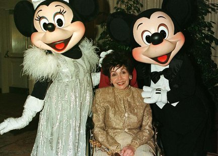 Actress Annette Funicello poses with Disney characters "Minnie Mouse " (L) and "Mickey Mouse" during a VIP reception February 15, 1997 prior Actress Annette Funicello poses with Disney characters "Minnie Mouse " (L) and "Mickey Mouse" during a VIP reception February 15, 1997 prior
